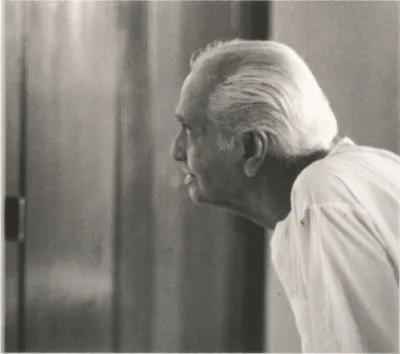 Ramesh during Guru Purnima celebration with devotees